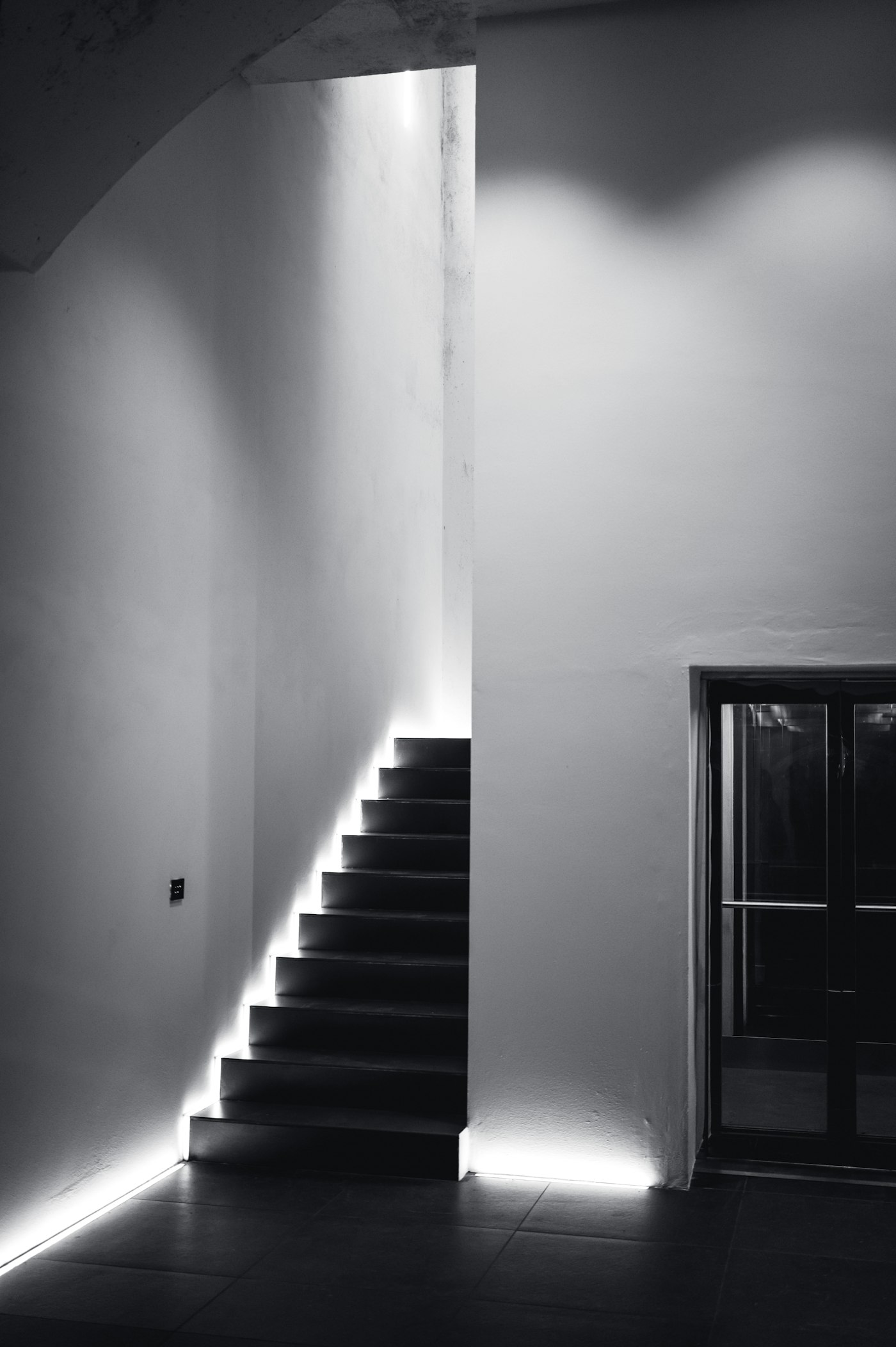 Dramatic modern staircase and interior architecture